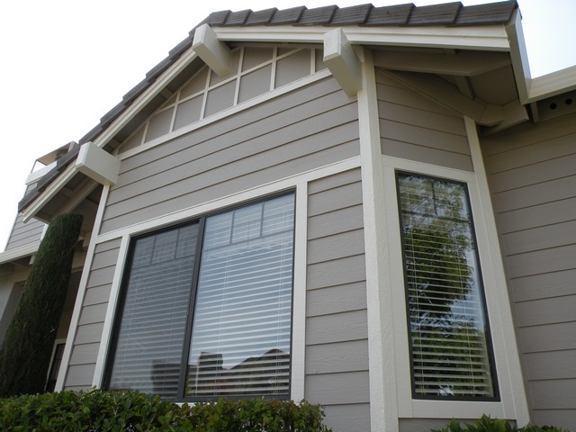 Completed exterior repaint with clean line work
