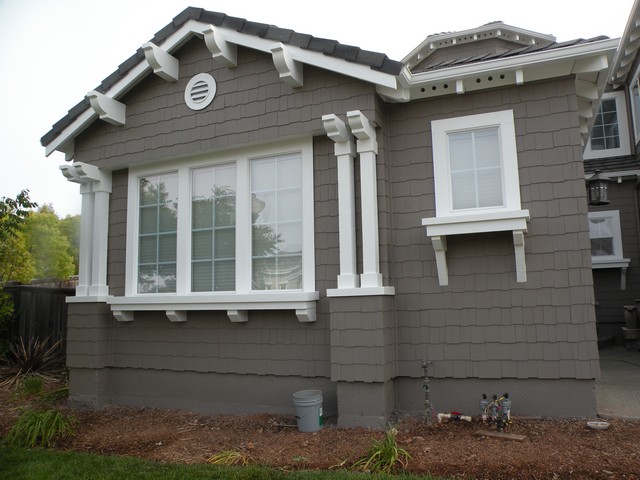 Craftsman detailing in deep taupe with white trim
